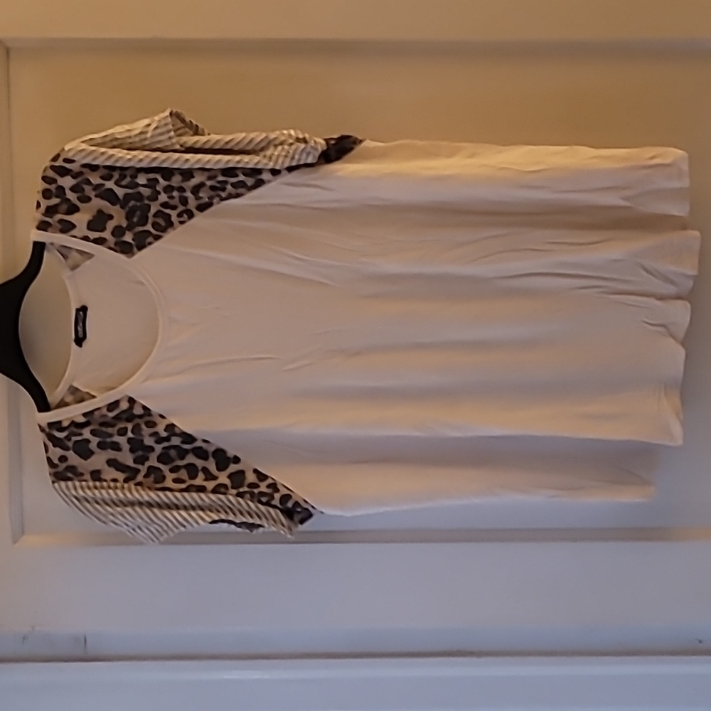 Heimish women's top with animal print sleeve